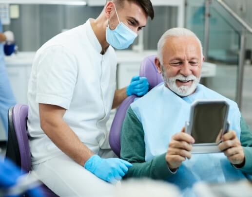 Dentist and dental patient discussing comprehensive dental care